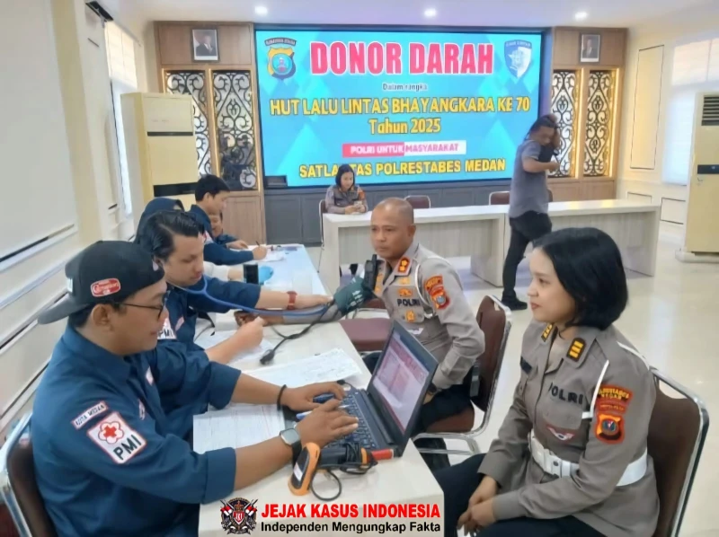 Satlantas Polrestabes Medan Rayakan HUT Lantas Bhayangkara ke-70 dengan Aksi Sosial Menyentuh Warga - www.tajamnews.co.id