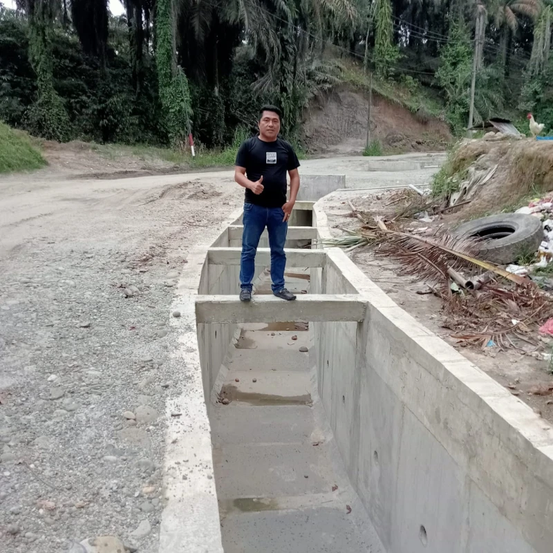 *Direktur APBD WATCH Apresiasi Pembangunan Drainase di Nagori Damakitang, Silou Kahean* - www.tajamnews.co.id